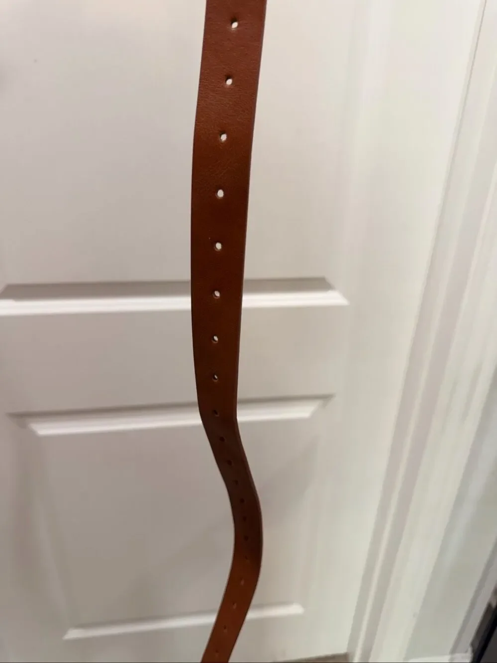 Buckle cognac ships